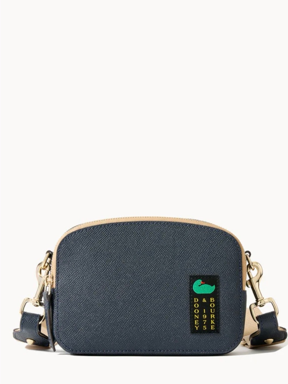 Dooney & Bourke  Alpine Ambler  20 pebbled leather crossbody bag with duck logo.